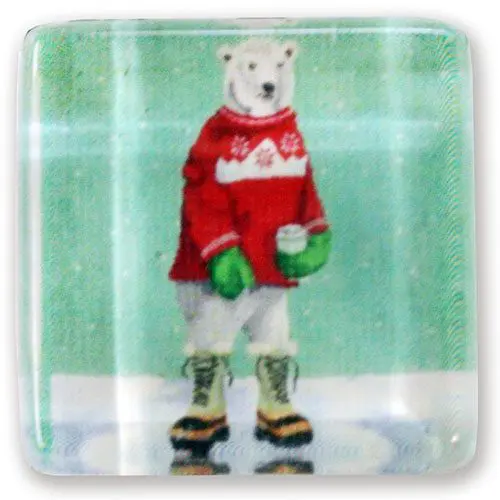 A polar bear wearing green boots and red sweater.