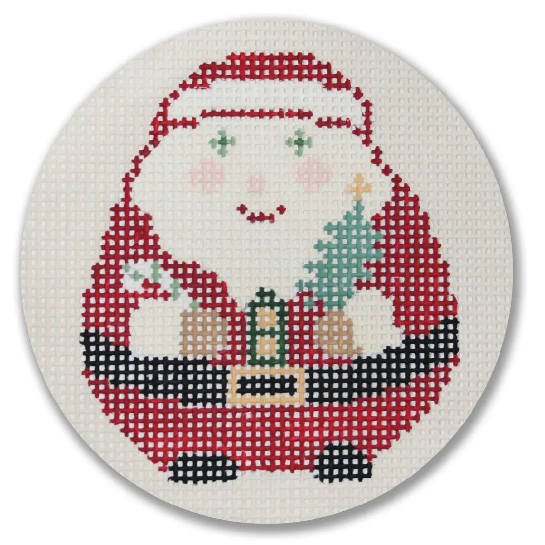 A cross stitch pattern of a santa claus holding a christmas tree designed by Cecilia Ohm Eriksen.