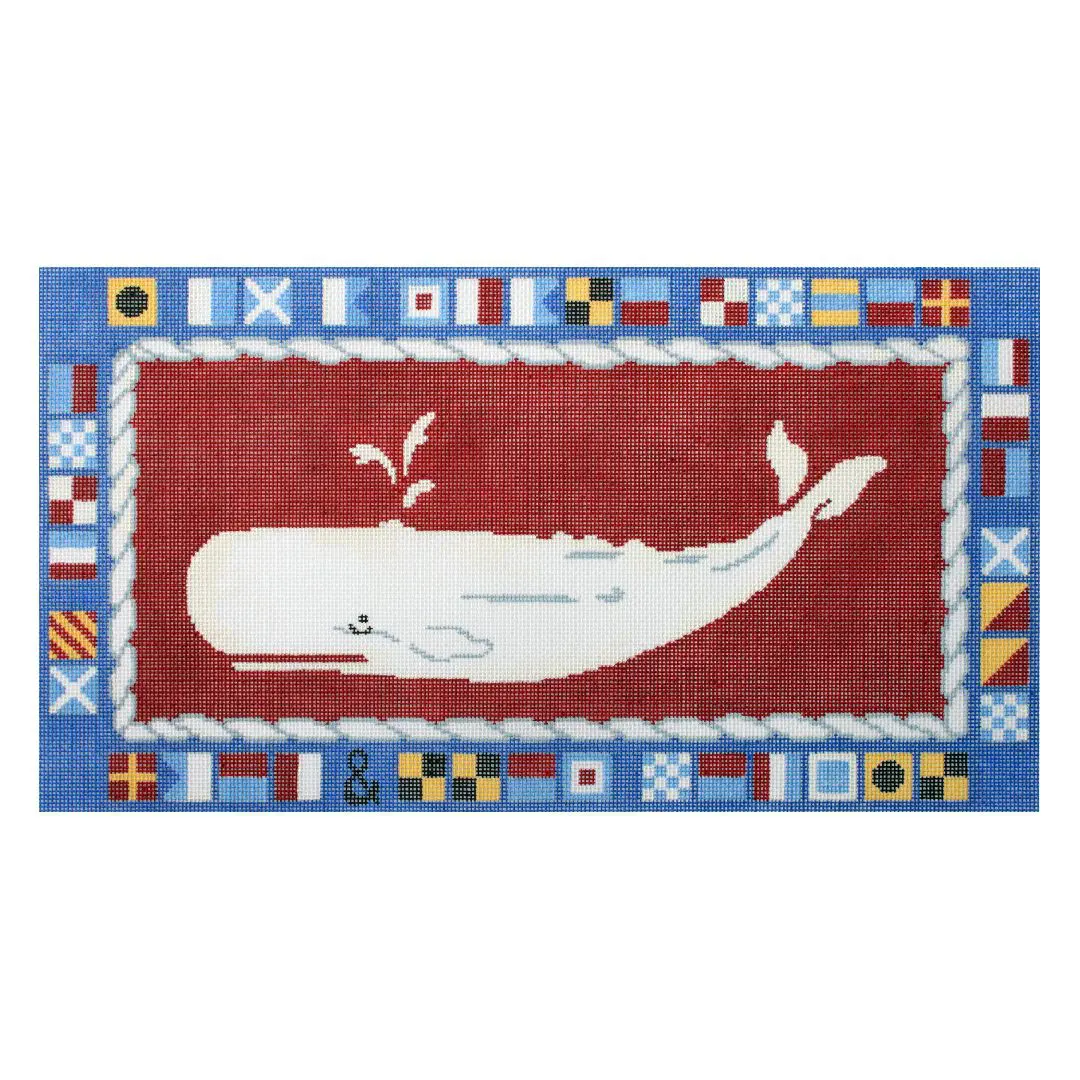 A rug featuring a whale and flags, designed by Cecilia Ohm Eriksen.