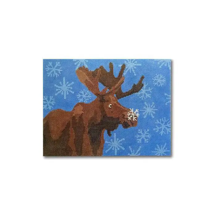 A painting of a moose with snowflakes on it, created by Cecilia Ohm Eriksen.