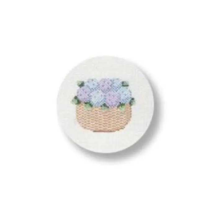 A cross stitch picture of a basket of flowers.