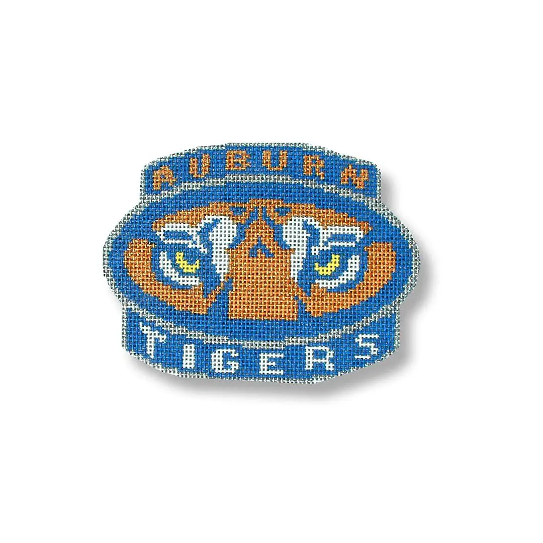 The auburn tigers logo, designed by Cecilia Ohm Eriksen, is shown on a white background.