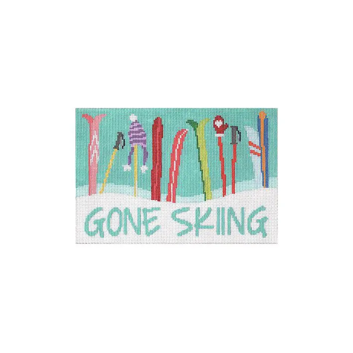 A doormat with skis on it that says gone skiing, designed by Cecilia Eriksen.