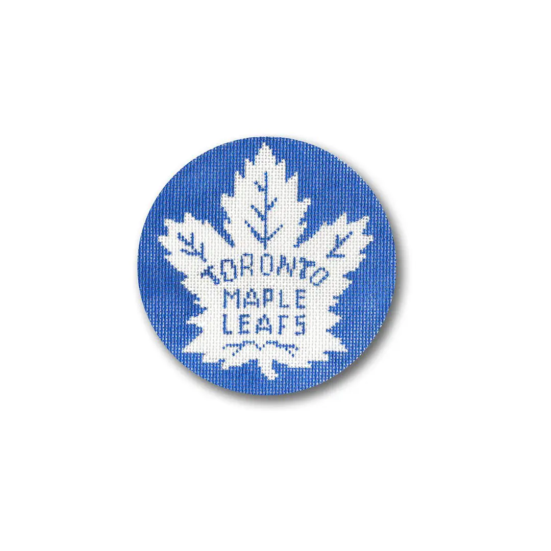 The Toronto Maple Leafs logo on a blue and white button.