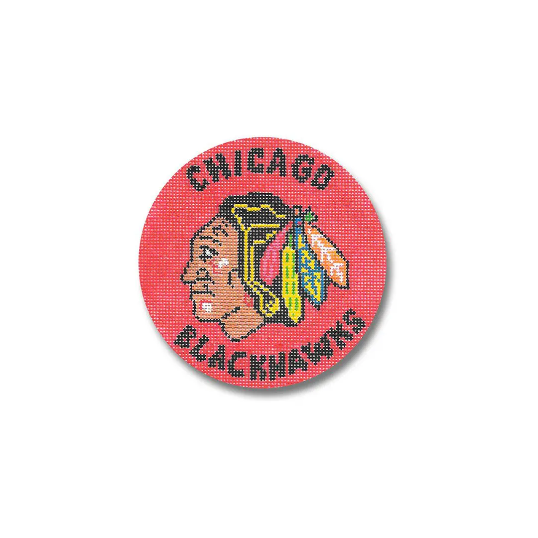 The Chicago Blackhawks logo on a red button, featuring Cecilia Ohm.