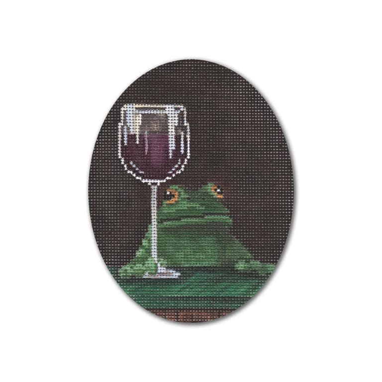 A cross stitch picture of a frog.