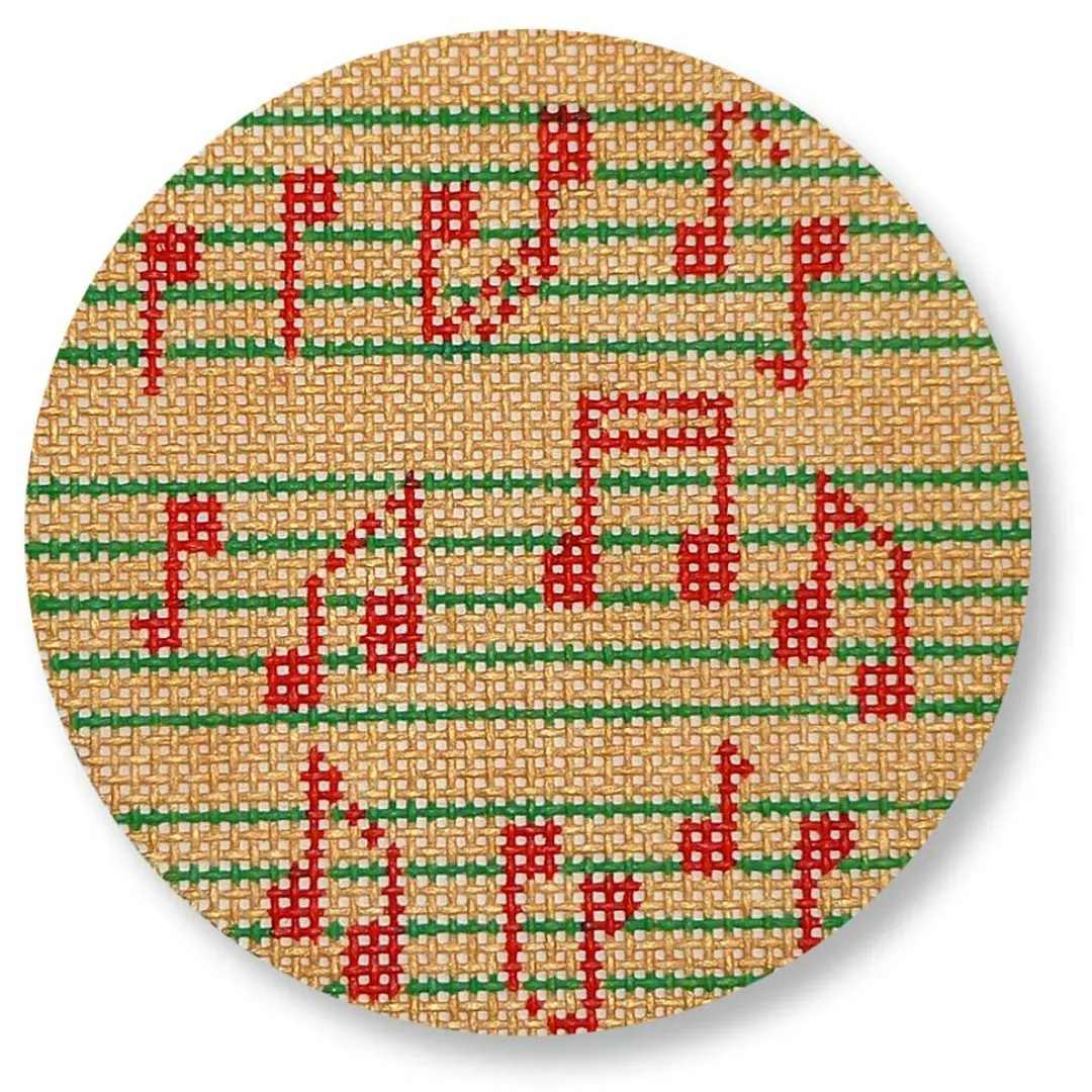 A round needlepoint canvas featuring music notes by Cecilia Ohm Eriksen.