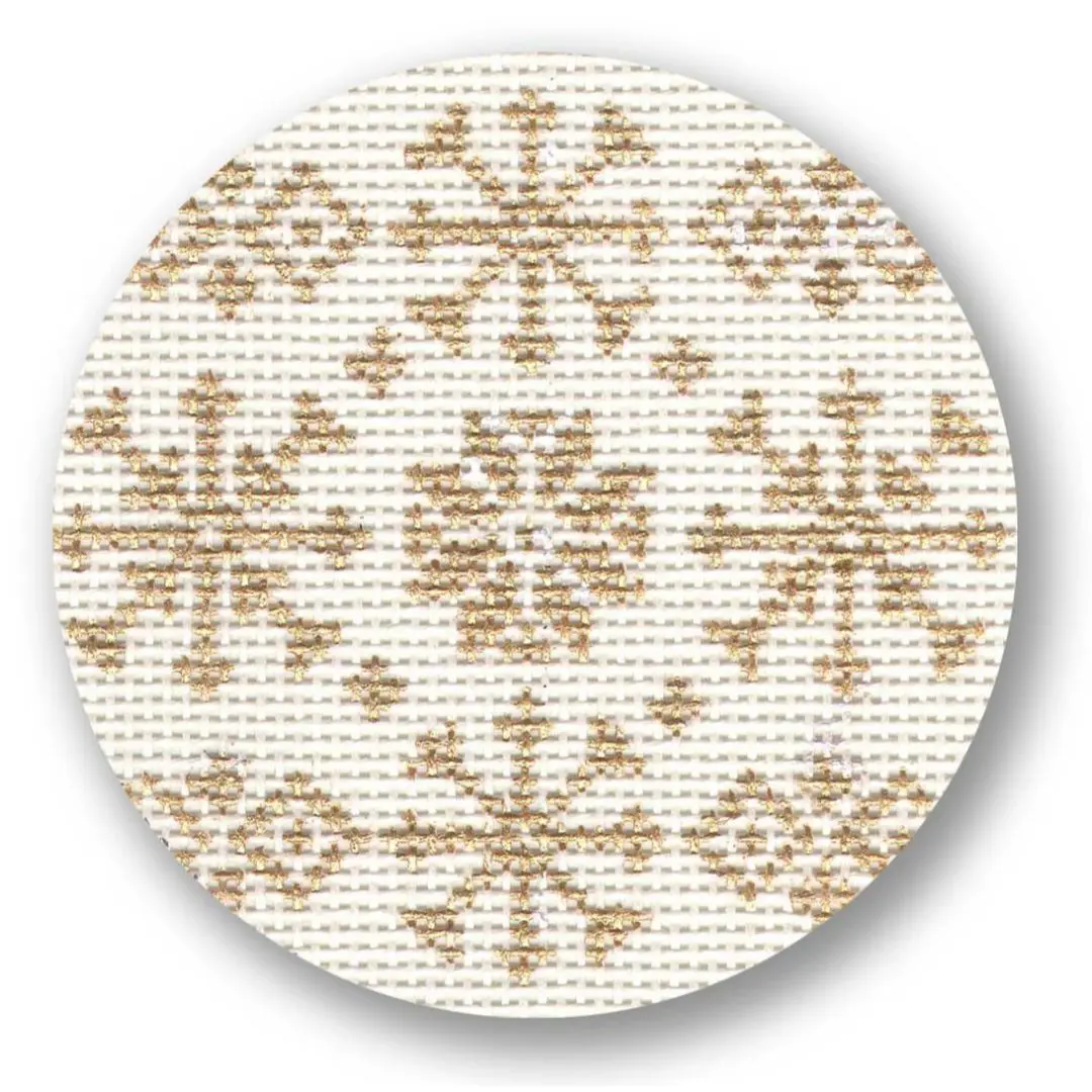 A round cross stitch pattern with snowflakes on it designed by Cecilia Ohm Eriksen.