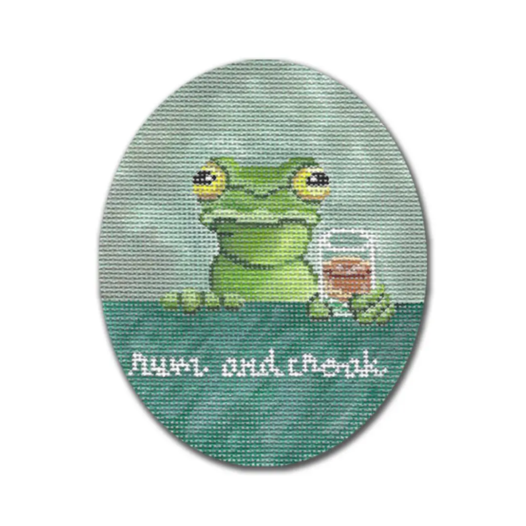 A cross stitch pattern featuring a whimsical frog enjoying a glass of wine.