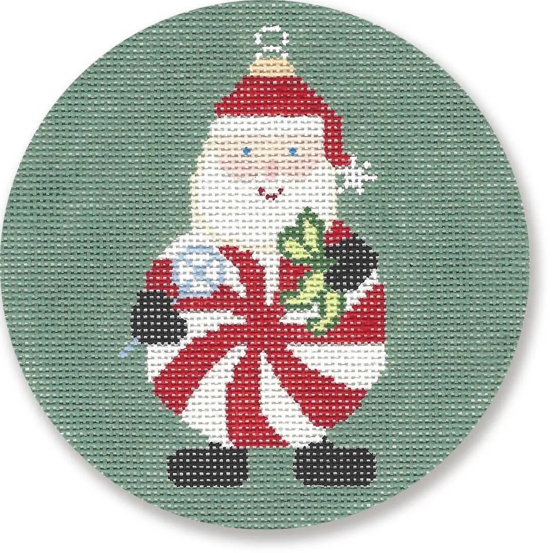 "Cecilia Ohm Eriksen created a delightful cross stitch pattern capturing the festive spirit with Santa Claus holding a candy cane.