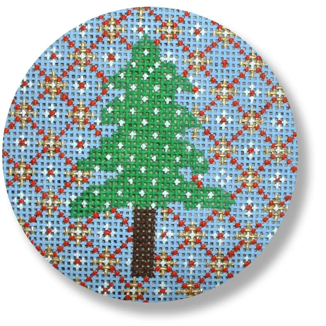 A cross stitched Christmas tree by Cecilia Ohm Eriksen on a blue background.