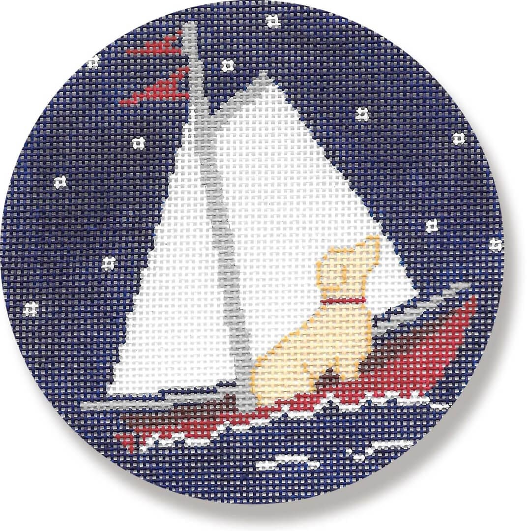 A cross stitch picture of a dog on a sailboat created by Cecilia Ohm Eriksen.