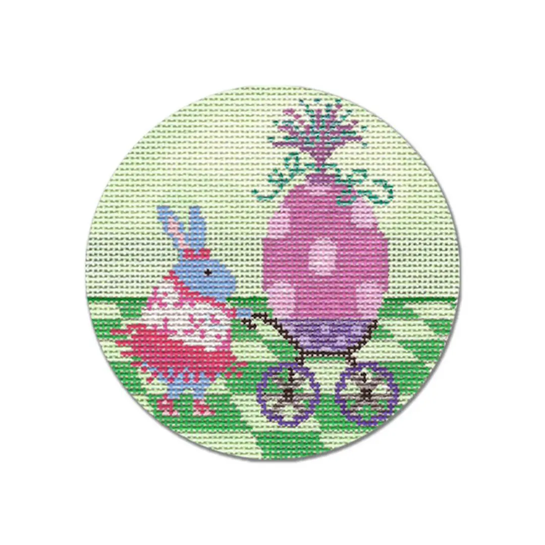 A cross stitch picture of a bunny and an egg by Cecilia Ohm Eriksen.