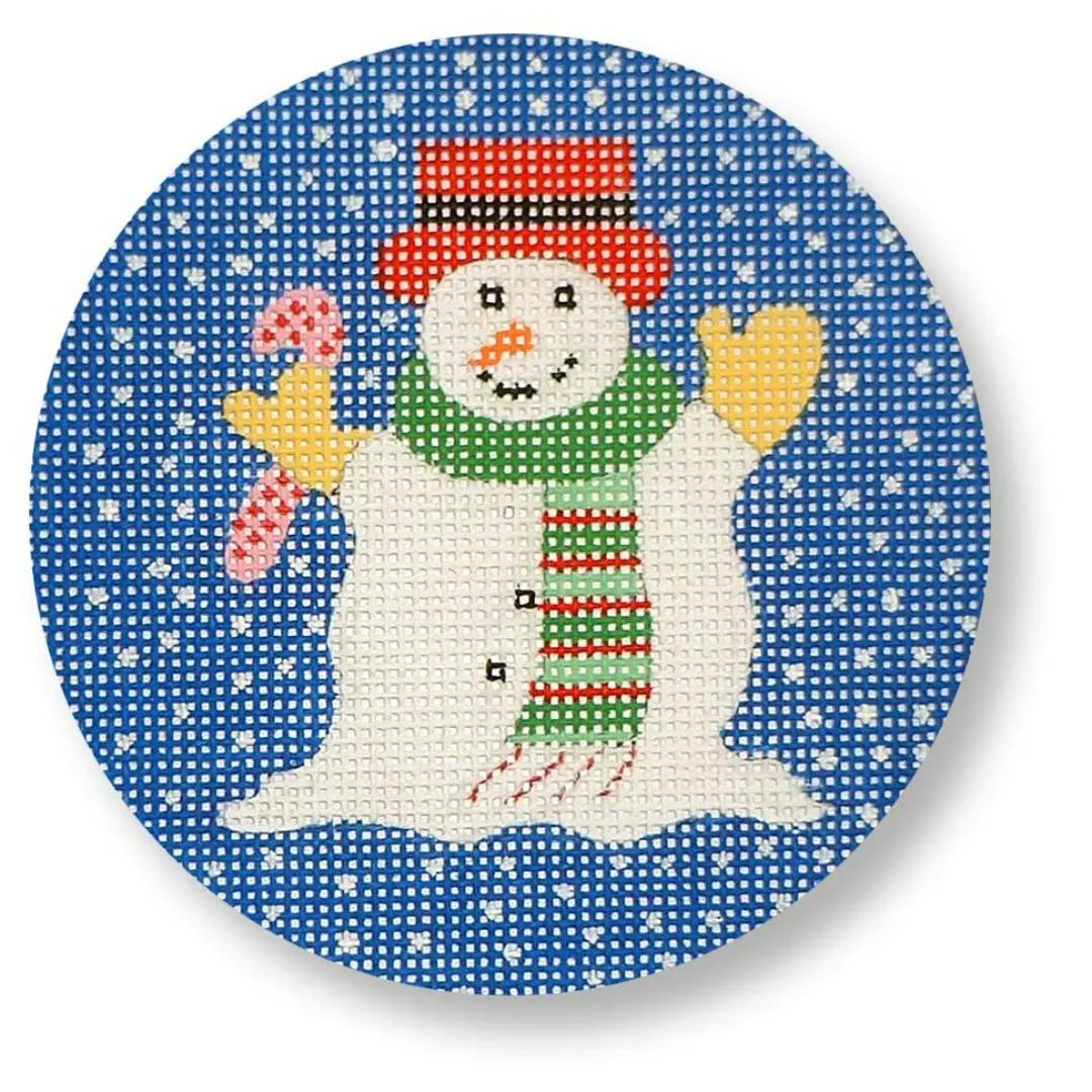 A cross stitch pattern of a snowman holding a candy cane, designed by Cecilia Ohm Eriksen.