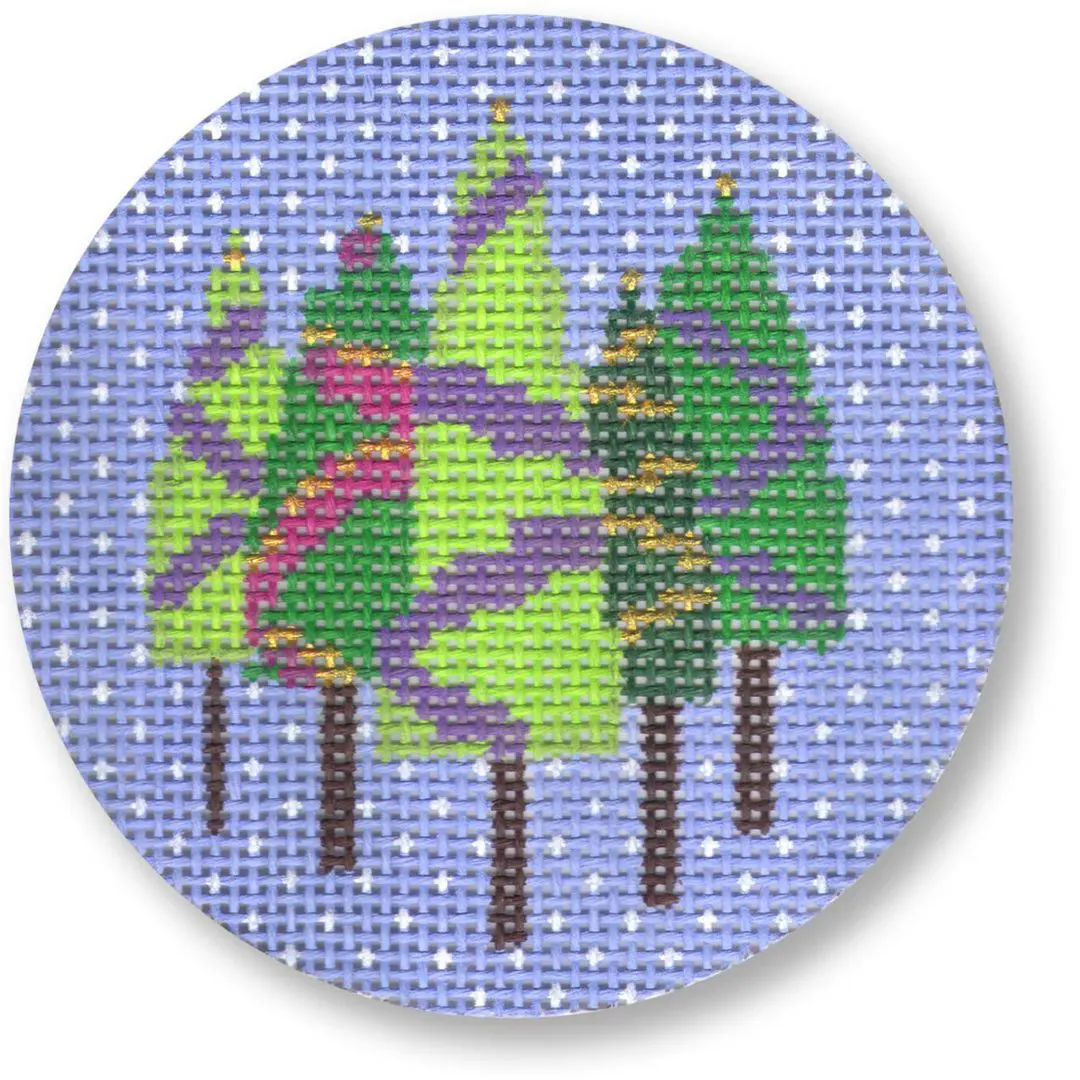 A cross stitch pattern by Cecilia Ohm Eriksen of christmas trees on a blue background.