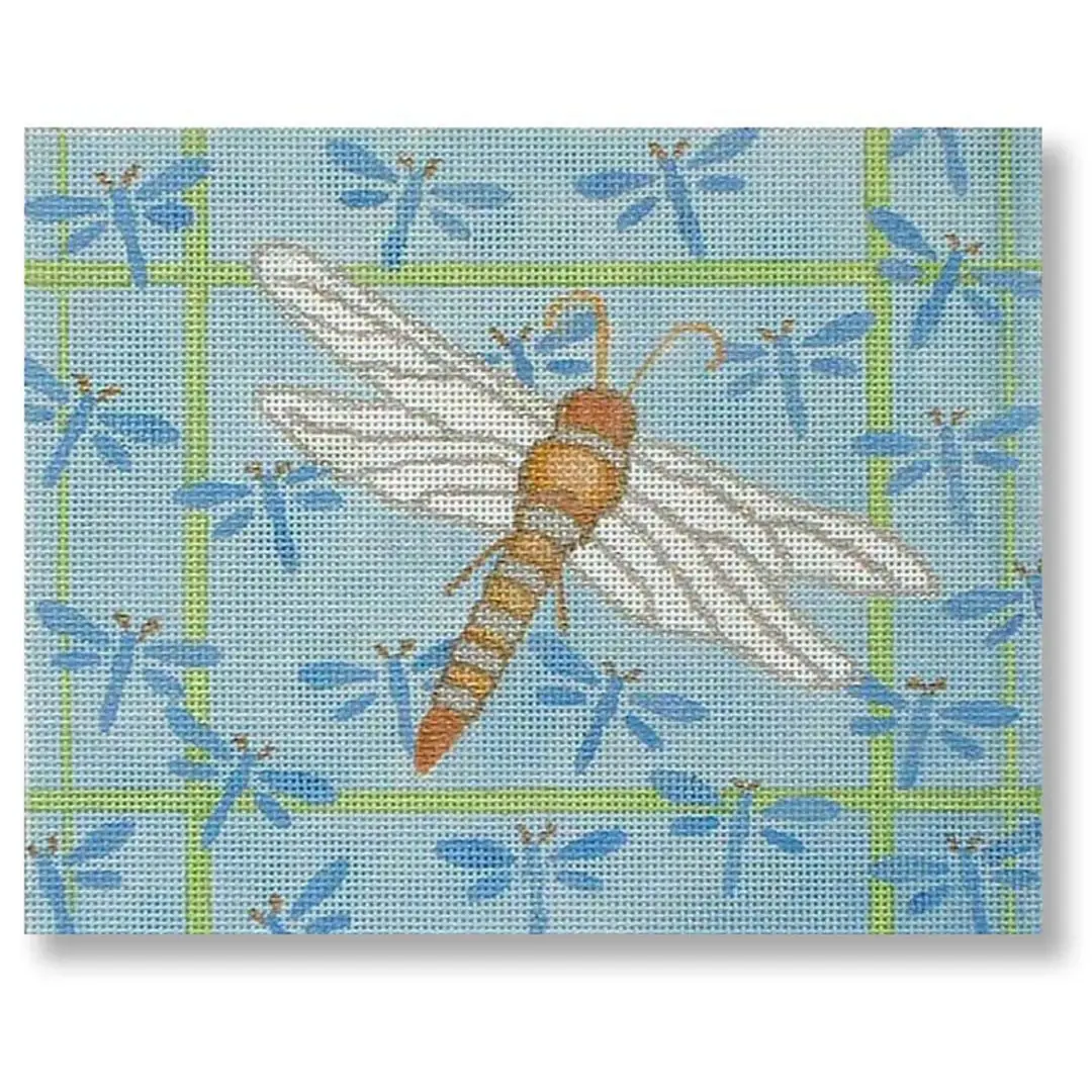 Cecilia Ohm Eriksen captures the beauty of a dragonfly on a vivid blue background.