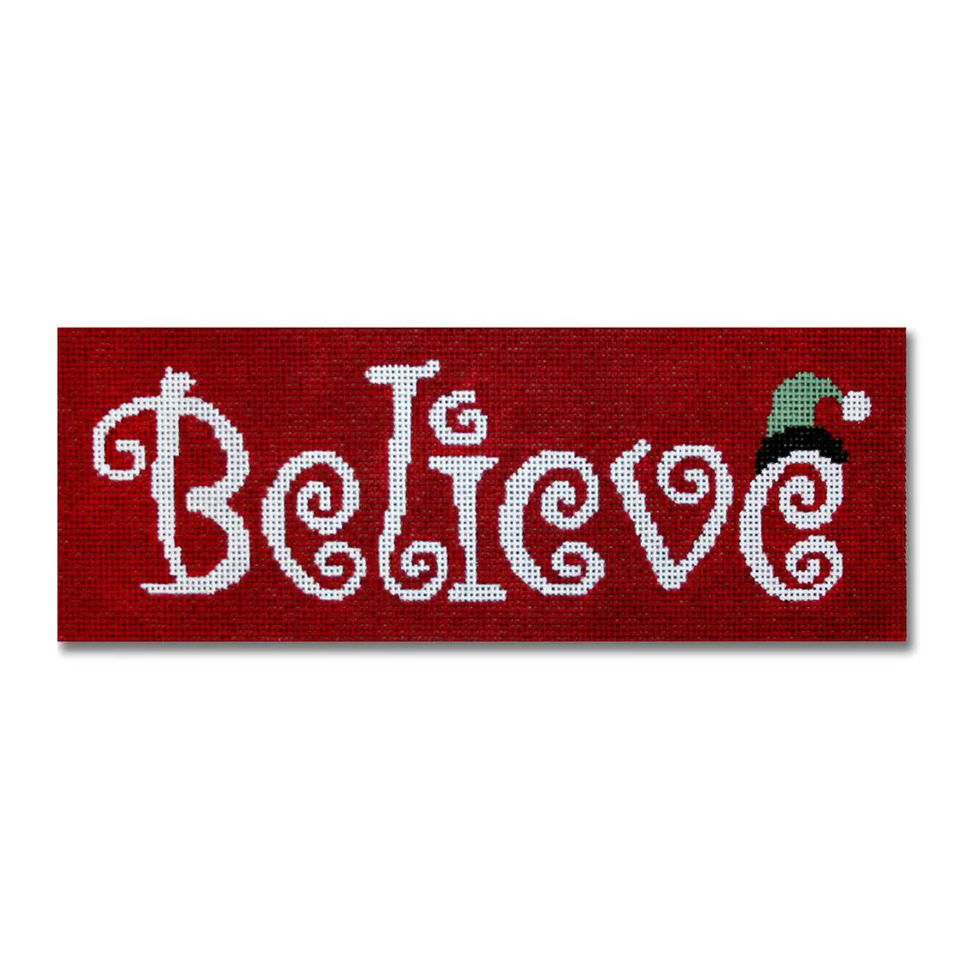 A red canvas with the word believe on it, created by Eriksen.