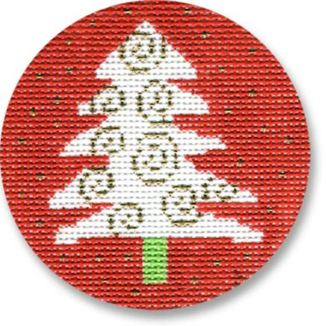 A Christmas tree on a red background adorned with Cecilia Ohm Eriksen ornaments.