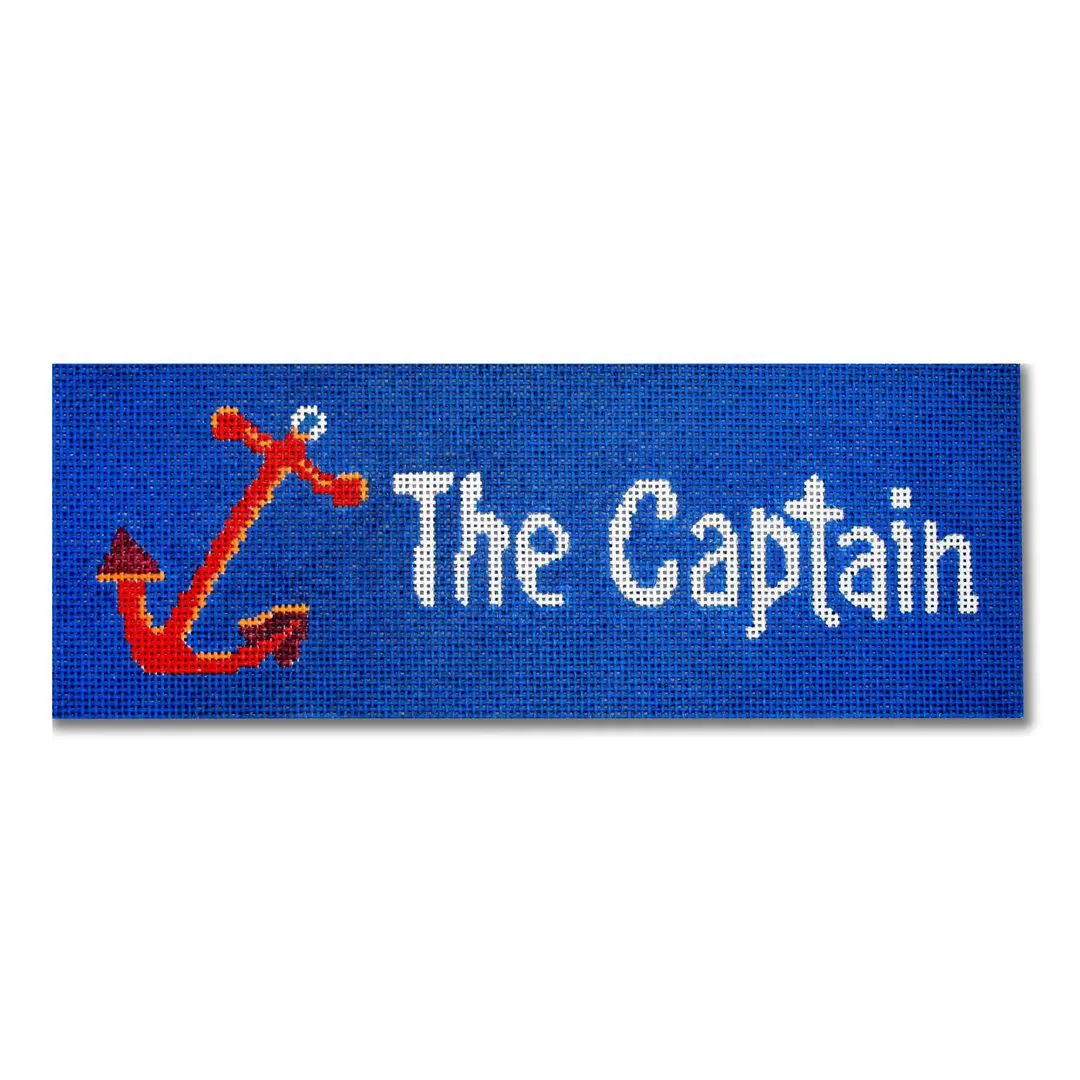 A blue doormat with the word captain on it, belonging to Cecilia Eriksen.