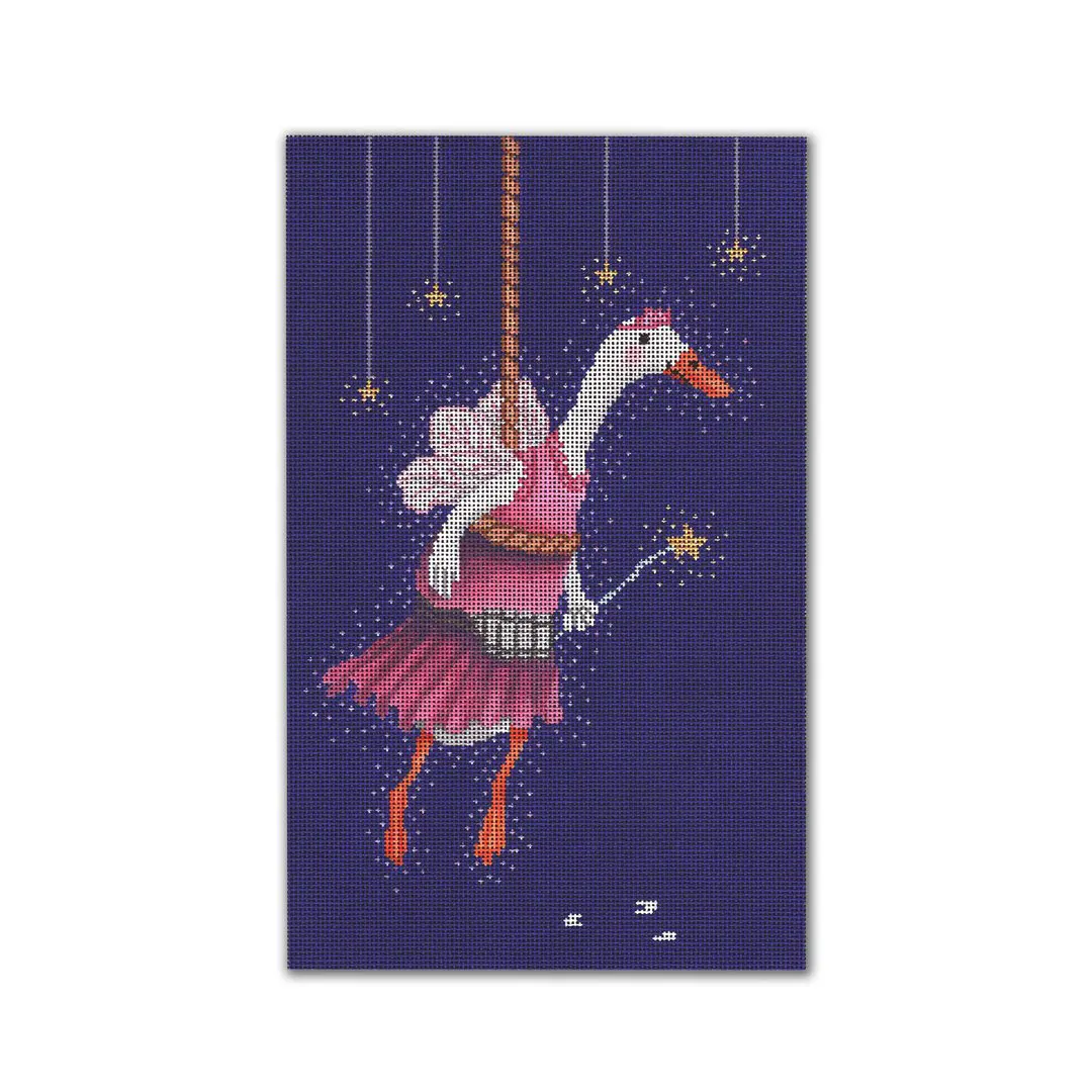 An image of a goose with a pink dress hanging from a swing, created by Cecilia Ohm Eriksen.