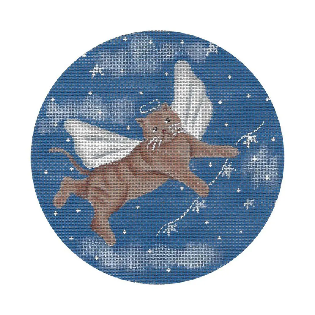 A cross stitch pattern of a cat flying in the sky, designed by Cecilia Ohm Eriksen.