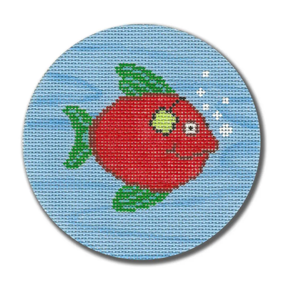 A Cecilia Ohm cross stitched fish on a blue background.