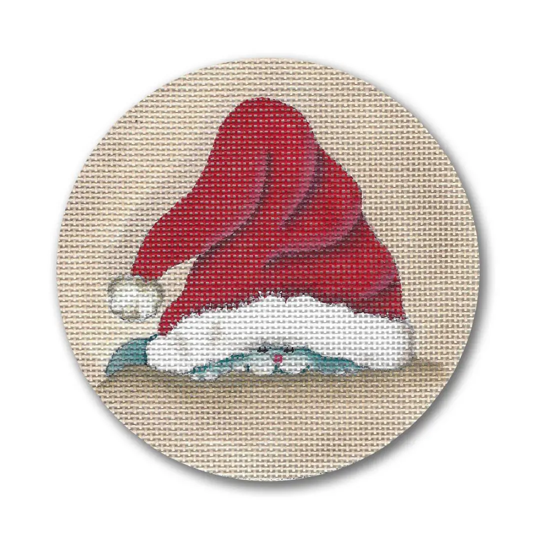 A cross stitch picture of a Santa hat created by Cecilia Ohm Eriksen.
