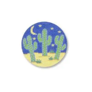 A cross stitch kit featuring a cactus in the desert designed by Cecilia Ohm Eriksen.