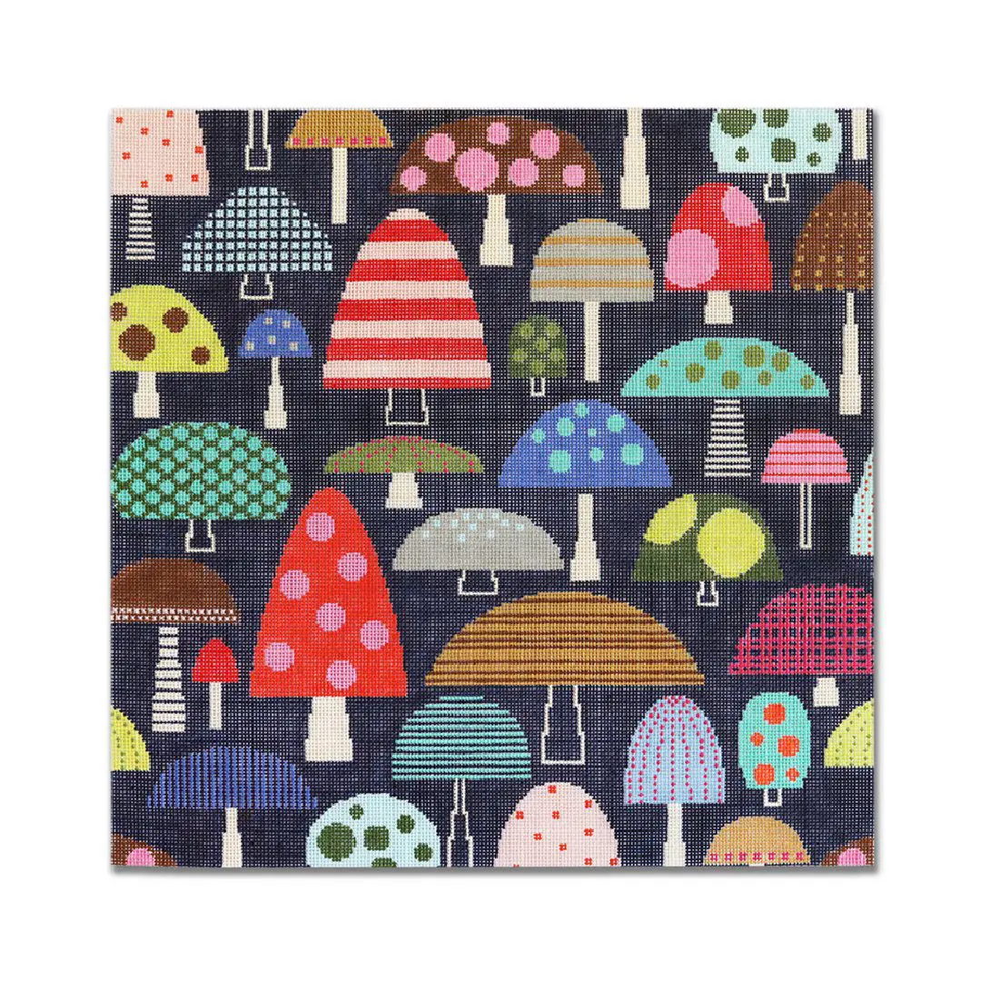 A dark blue fabric with colorful mushrooms on it designed by Cecilia Ohm Eriksen.