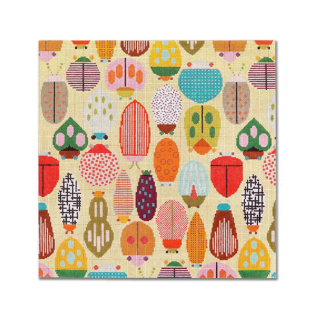 A beige background with a colorful pattern of ladybugs designed by Cecilia Ohm Eriksen.