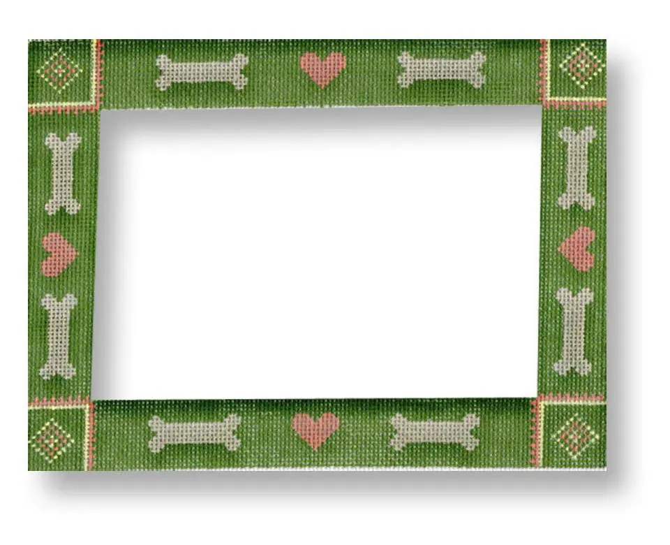 A green picture frame with hearts on it.