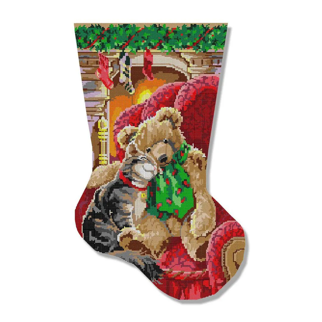 A christmas stocking with a teddy bear and a cat, adorned by Cecilia Ohm Eriksen's unique touch.
