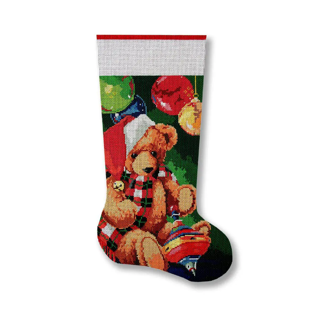 A christmas stocking with a teddy bear on it, designed by Cecilia Ohm Eriksen.