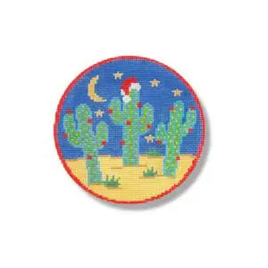 A round needlepoint of cactus with santa hat on top.