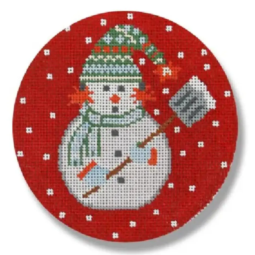 A snowman with a broom on a red background, created by Cecilia Ohm Eriksen.