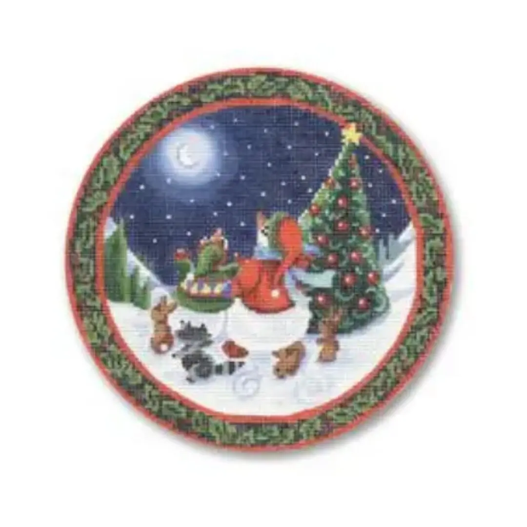 A christmas plate with a picture of santa and his reindeer, designed by Cecilia Ohm Eriksen.
