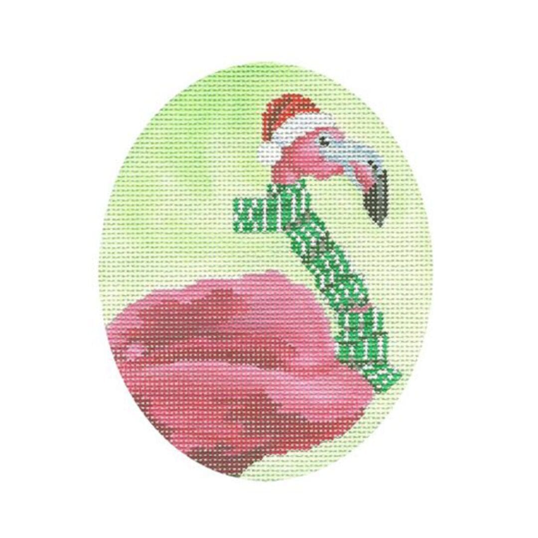 A flamingo wearing a santa hat on a green background.