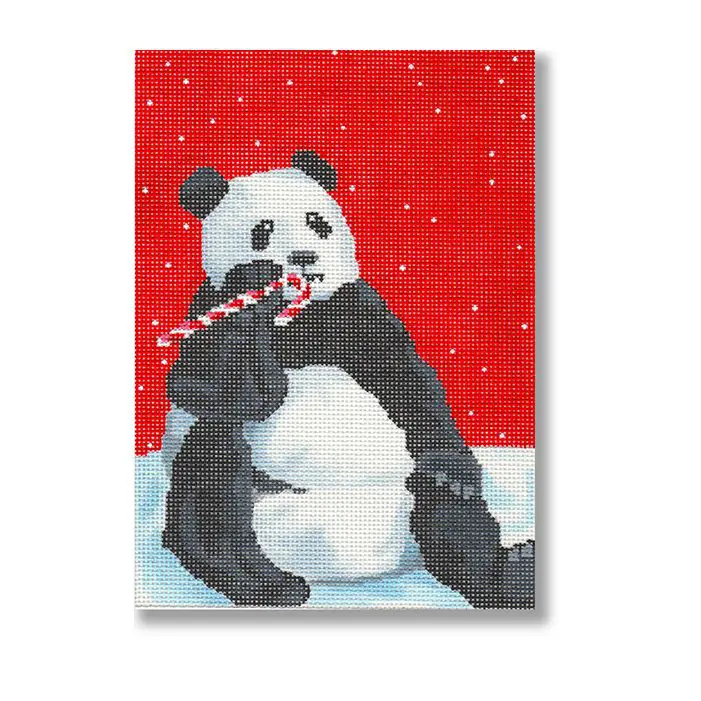 A panda bear eating a candy cane on a red background.