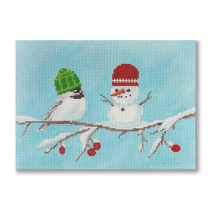 A cross stitch picture of two snowmen sitting on a branch.