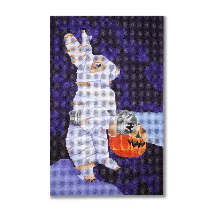 A painting of a rabbit holding a pumpkin.