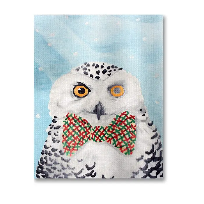 A painting of a snowy owl with a bow tie.