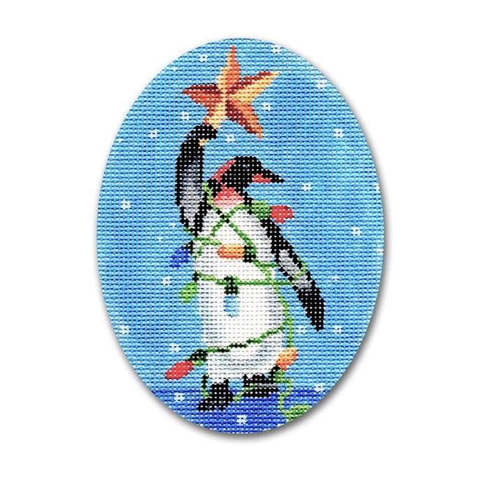 A penguin is holding a christmas star.