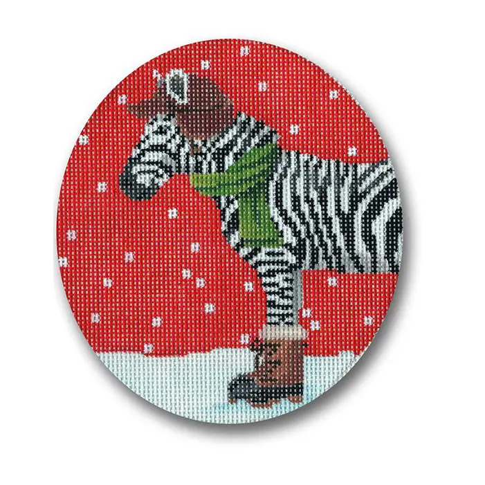 A zebra wearing a hat and scarf on a red background.