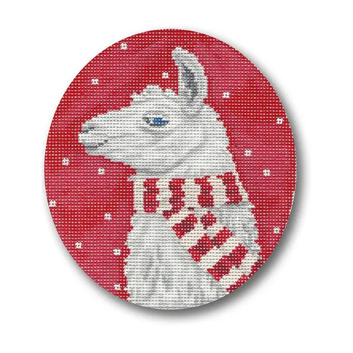 A cross stitch picture of a llama wearing a scarf.