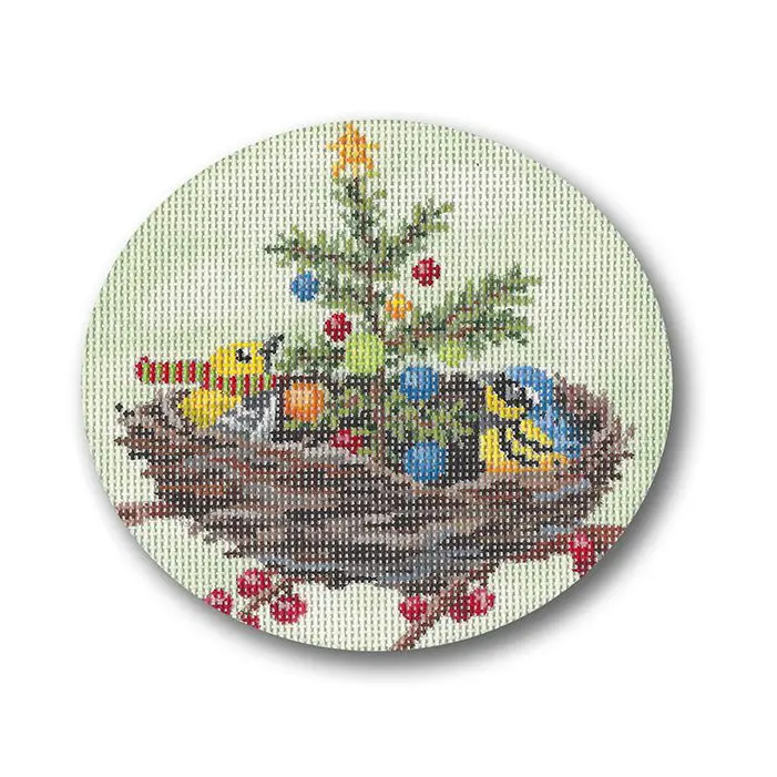 A cross stitch picture of two birds in a nest.