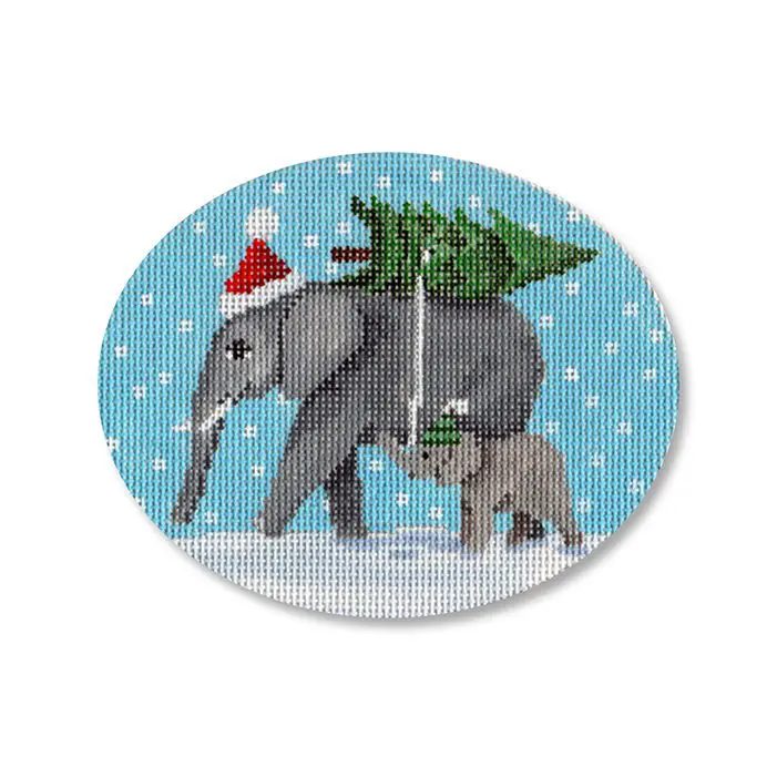 A cross stitch picture of an elephant carrying a christmas tree.