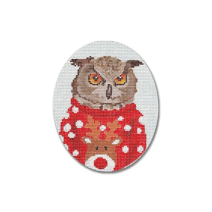 A cross stitch pattern of an owl in a red sweater.