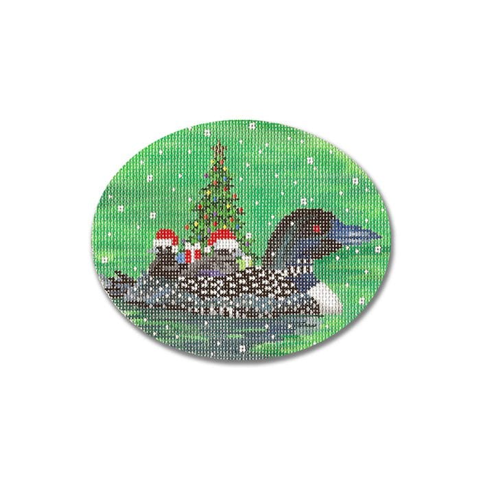 A cross stitch pattern of a loon with a christmas tree.