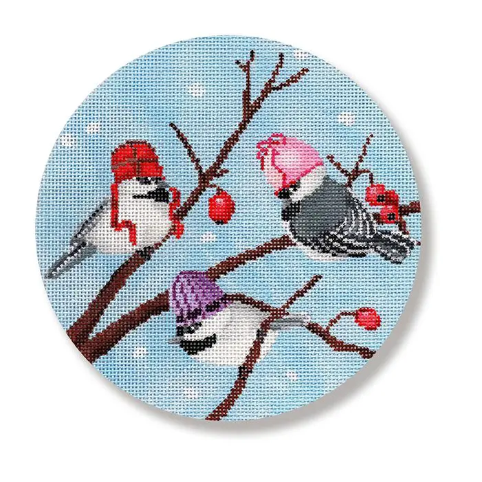 Three chickadees sitting on a branch with hats on.
