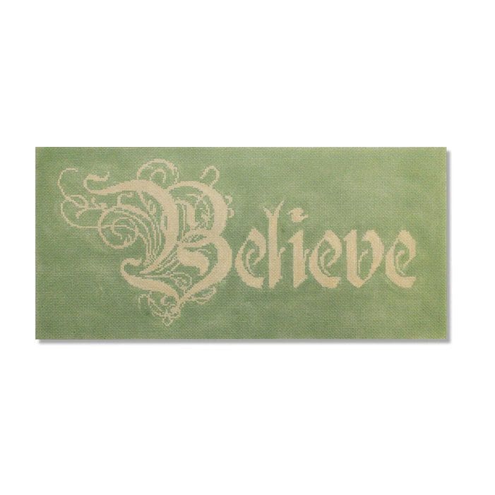 A green chalkboard with the word believe on it, signed by Cecilia Ohm Eriksen.